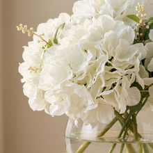 Close-up detail of the white hydrangea blooms and dark nite-berries in the Classic glass bowl.
