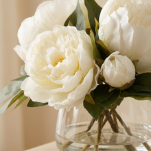 Close-up of the ruffled cream peony petals in the Classic glass bowl.